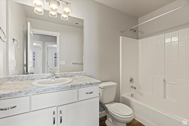 full bathroom with vanity, toilet, and shower / bathing tub combination