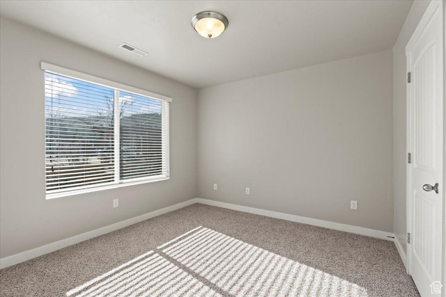 empty room featuring carpet floors