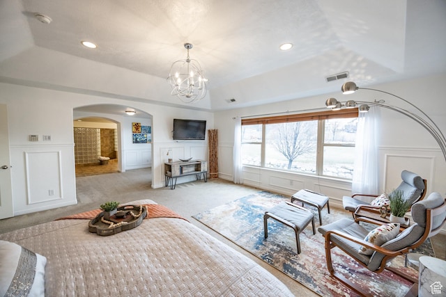 1903 W Wild Wood Ct N, Lehi, UT 84043 - bedroom featuring a notable chandelier, a tray ceiling, and light colored carpet