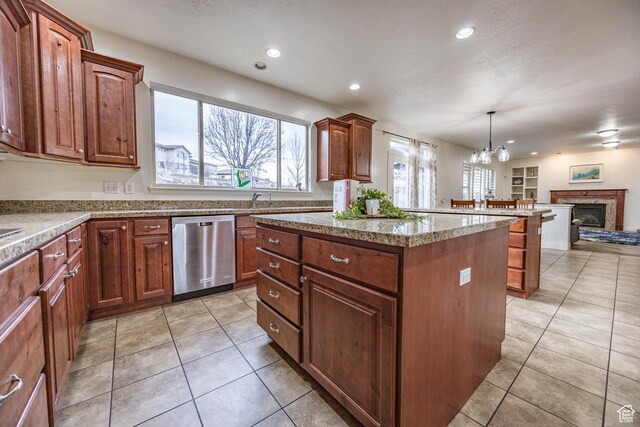 1903 W Wild Wood Ct N, Lehi, UT 84043 - kitchen featuring a kitchen island, pendant lighting, dishwasher, a chandelier, and light tile patterned floors