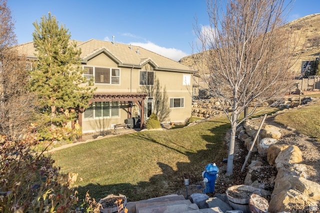 1903 W Wild Wood Ct N, Lehi, UT 84043 - rear view of house with a pergola and a lawn