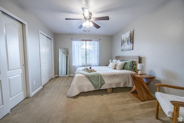 1903 W Wild Wood Ct N, Lehi, UT 84043 - carpeted bedroom with ceiling fan and two closets