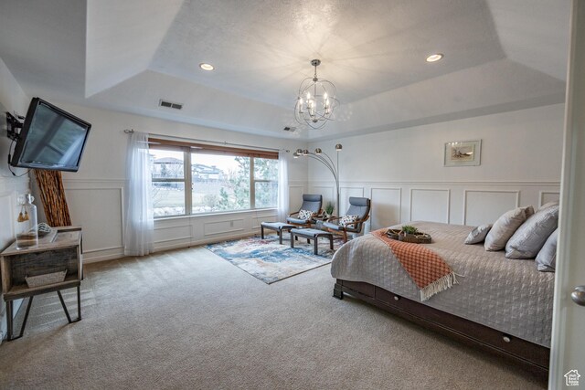 1903 W Wild Wood Ct N, Lehi, UT 84043 - bedroom with an inviting chandelier, a tray ceiling, and carpet flooring