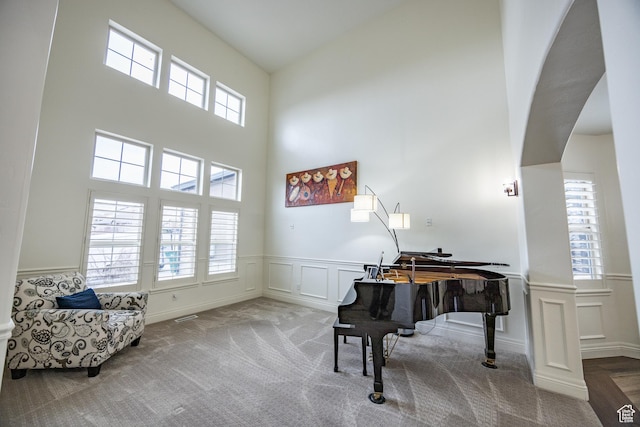 1903 W Wild Wood Ct N, Lehi, UT 84043 - living area featuring a towering ceiling and carpet flooring