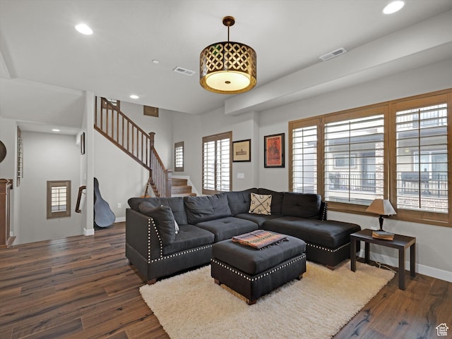 living room featuring dark hardwood / wood-style flooring