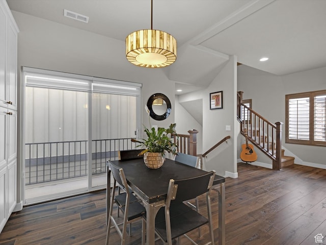 dining room featuring dark hardwood / wood-style flooring