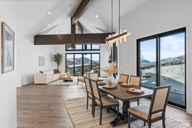 11432 N Fox Hollow Ct Unit 121, Hideout, UT 84036 - dining space featuring high vaulted ceiling, light wood-style flooring, beam ceiling, and a mountain view