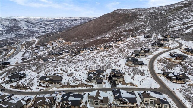 11432 N Fox Hollow Ct Unit 121, Hideout, UT 84036 - snowy aerial view with a residential view and a mountain view