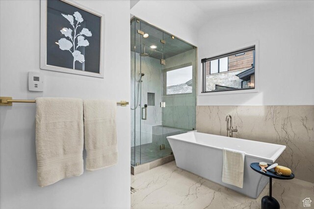 11432 N Fox Hollow Ct Unit 121, Hideout, UT 84036 - full bath featuring marble finish floor, a stall shower, and a soaking tub