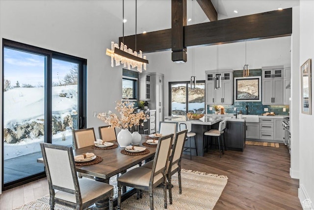 11432 N Fox Hollow Ct Unit 121, Hideout, UT 84036 - dining room featuring a high ceiling, wood finished floors, and beam ceiling