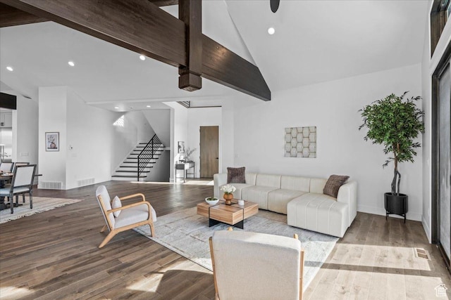 11432 N Fox Hollow Ct Unit 121, Hideout, UT 84036 - living area featuring visible vents, high vaulted ceiling, wood finished floors, and stairway