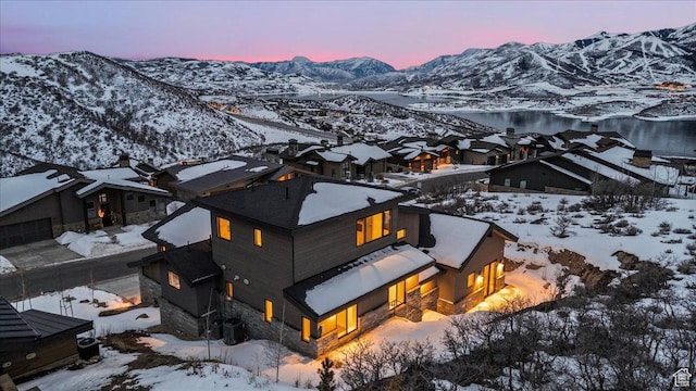11432 N Fox Hollow Ct Unit 121, Hideout, UT 84036 - snowy aerial view with a mountain view