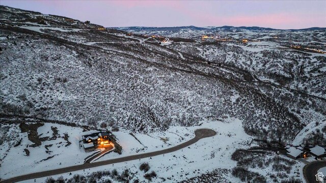 11432 N Fox Hollow Ct Unit 121, Hideout, UT 84036 - snowy aerial view featuring a mountain view