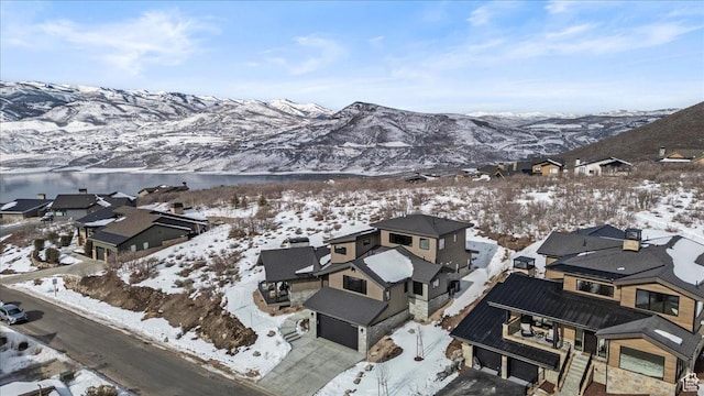 11432 N Fox Hollow Ct Unit 121, Hideout, UT 84036 - snowy aerial view featuring a residential view and a water and mountain view