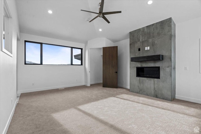 11432 N Fox Hollow Ct Unit 121, Hideout, UT 84036 - interior space with lofted ceiling, recessed lighting, a tiled fireplace, and carpet