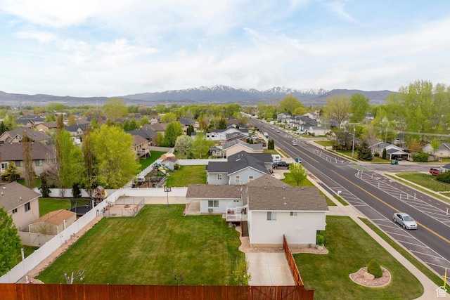birds eye view of property featuring a residential view and a mountain view