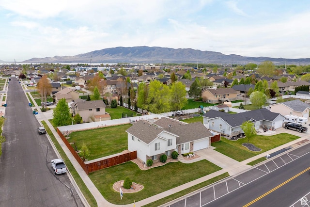 drone / aerial view with a mountain view and a residential view