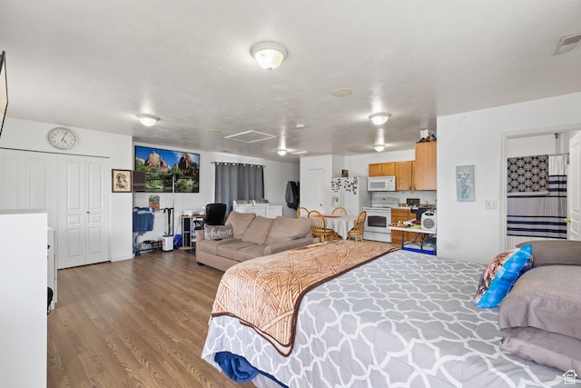 bedroom with wood finished floors