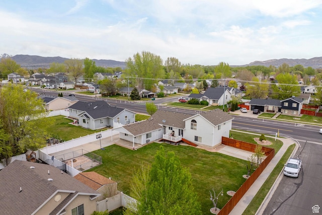 aerial view with a mountain view and a residential view