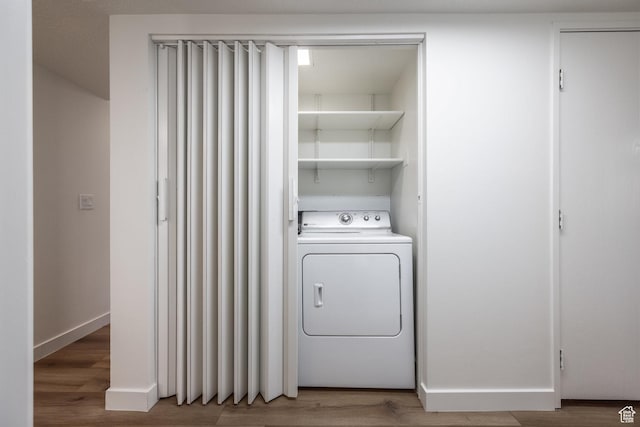 245 N Vine St W Unit 501, Salt Lake City, UT 84103 - laundry room featuring hardwood / wood-style flooring and washer / dryer