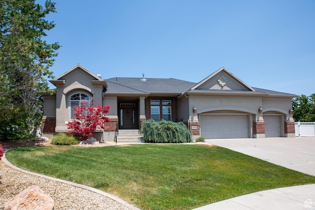 3684 W 850 N, Layton, UT 84041 - view of front of house with concrete driveway, a garage, and stucco siding