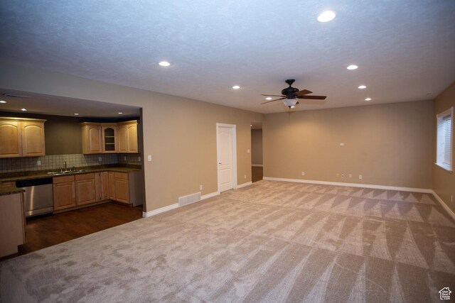 interior space featuring recessed lighting, carpet, visible vents, and baseboards