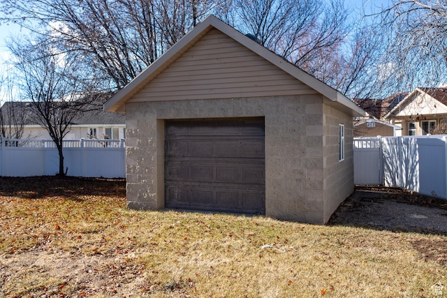 detached garage with fence