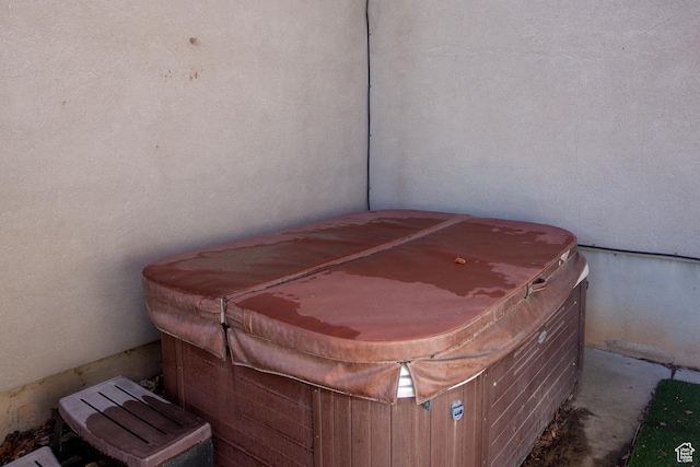 exterior details featuring a jacuzzi