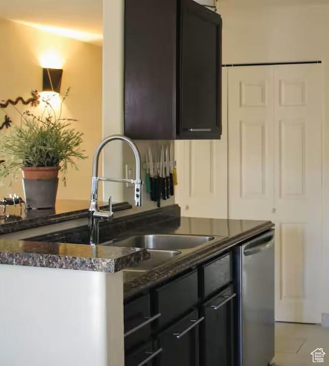 3280 E Fairway Loop Unit 10-B, Moab, UT 84532 - kitchen with dishwasher, sink, and dark stone counters