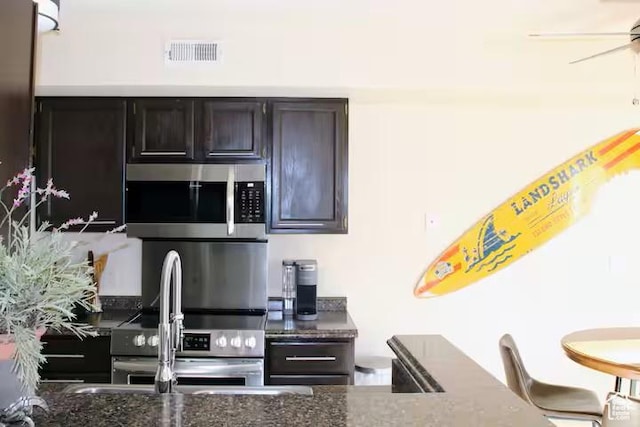 3280 E Fairway Loop Unit 10-B, Moab, UT 84532 - kitchen with ceiling fan and appliances with stainless steel finishes