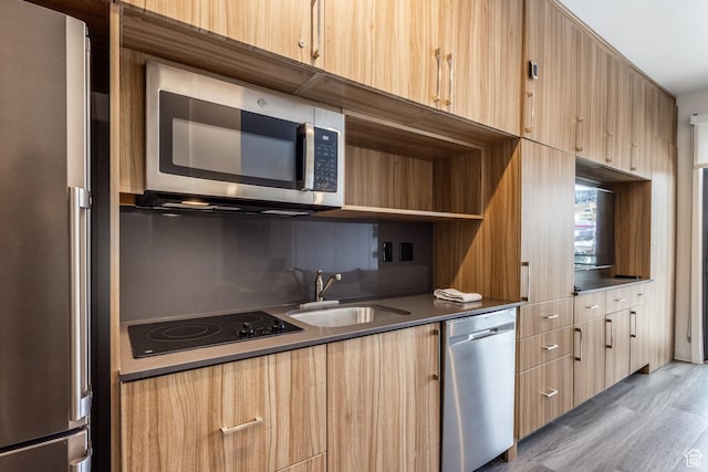 2670 Canyons Resort Dr Unit 420, Park City, UT 84098 - kitchen with stainless steel appliances, sink, backsplash, and dark hardwood / wood-style flooring