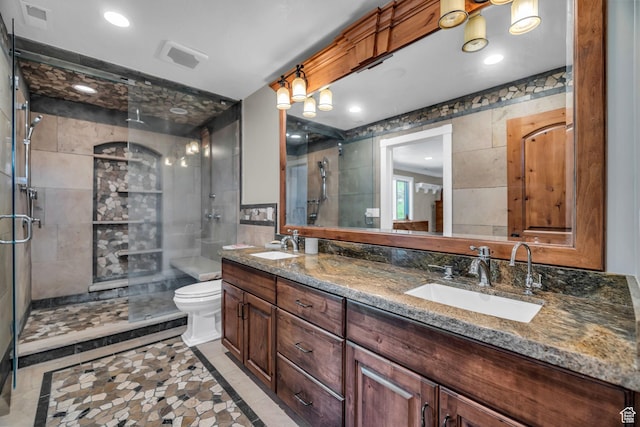 2410 E Center Creek Rd, Heber City, UT 84032 - bathroom with vanity, toilet, tile walls, and walk in shower