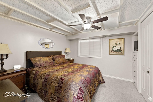 carpeted bedroom featuring ceiling fan