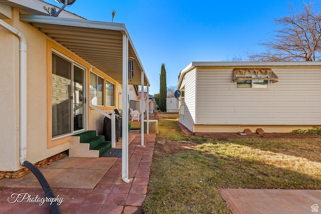 view of yard with a patio area