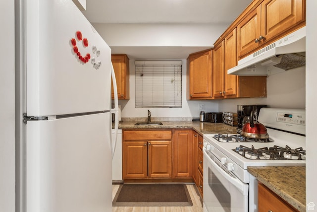 251 S 700 E Unit 11, Salt Lake City, UT 84102 - kitchen with sink, light stone counters, and white appliances