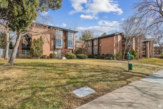 exterior space featuring a front lawn