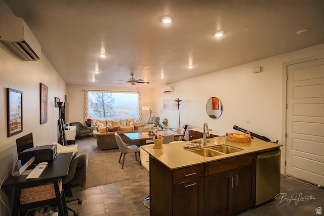 5160 W Villas N Dr N Unit 6-105, Hurricane, UT 84737 - kitchen with dark brown cabinetry, sink, a wall mounted air conditioner, stainless steel dishwasher, and a kitchen island with sink
