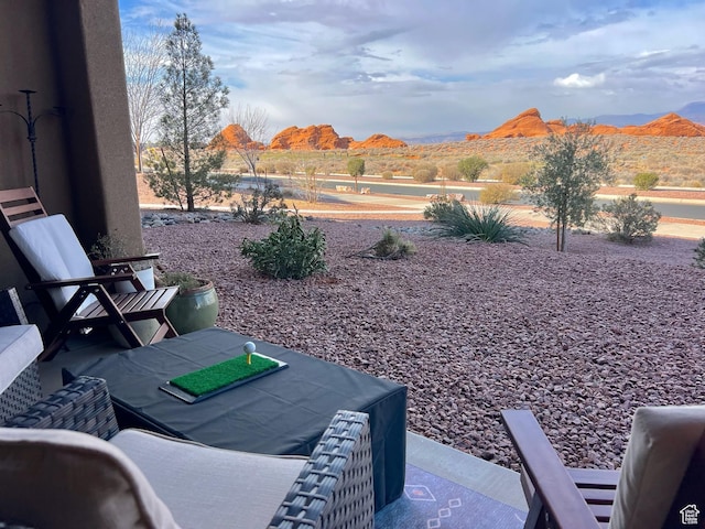 5160 W Villas N Dr N Unit 6-105, Hurricane, UT 84737 - view of patio / terrace featuring a mountain view