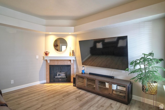 5338 S Beacon Hill Cir W Unit 181, Salt Lake City, UT 84123 - living room featuring wood-type flooring and a fireplace