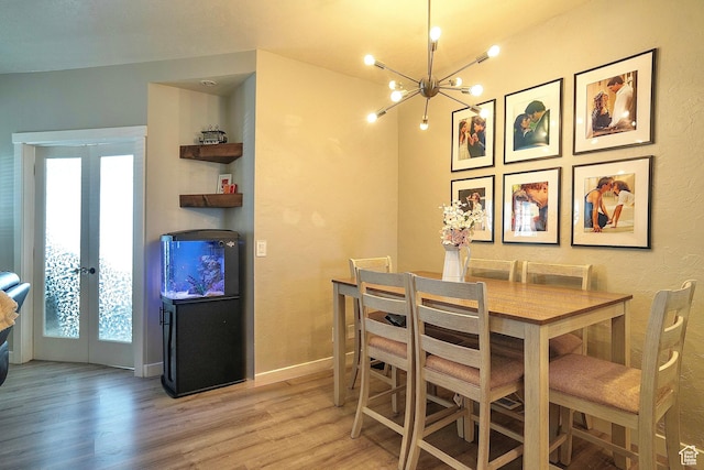 5338 S Beacon Hill Cir W Unit 181, Salt Lake City, UT 84123 - dining area featuring plenty of natural light, french doors, and light wood-type flooring