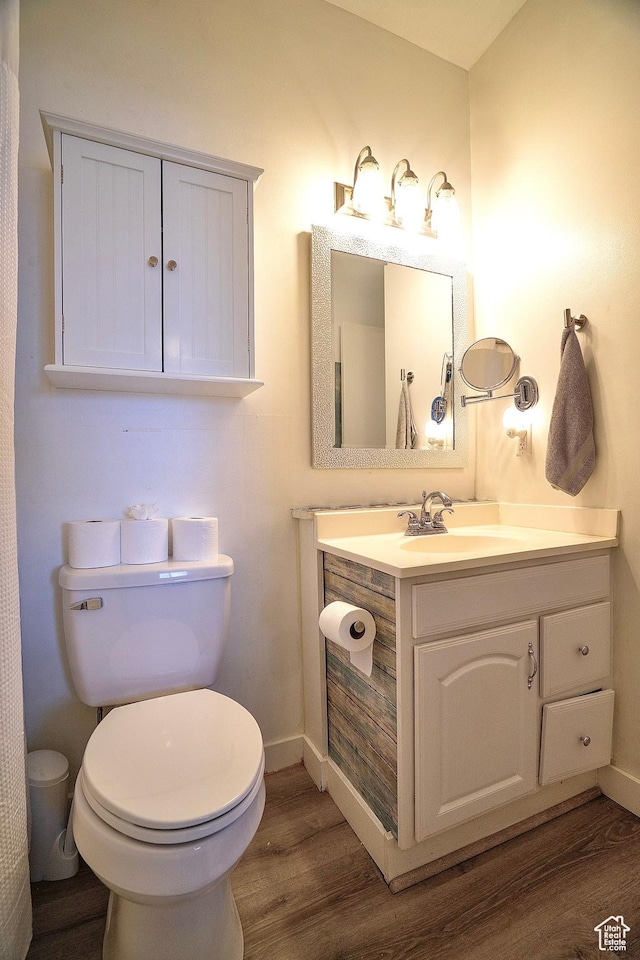 5338 S Beacon Hill Cir W Unit 181, Salt Lake City, UT 84123 - bathroom featuring hardwood / wood-style flooring, vanity, and toilet