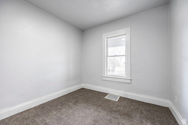view of carpeted spare room