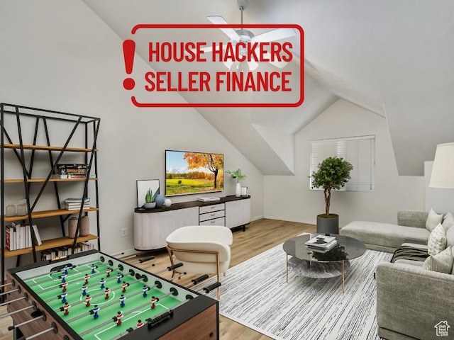 475 N Redwood Rd Unit 80, Salt Lake City, UT 84116 - recreation room featuring vaulted ceiling and wood finished floors