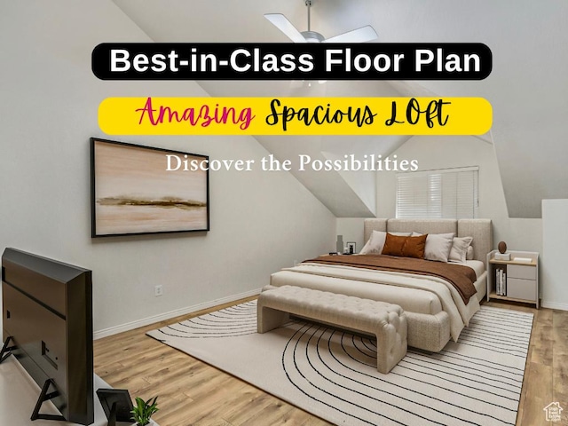 bedroom with wood finished floors, vaulted ceiling, and baseboards
