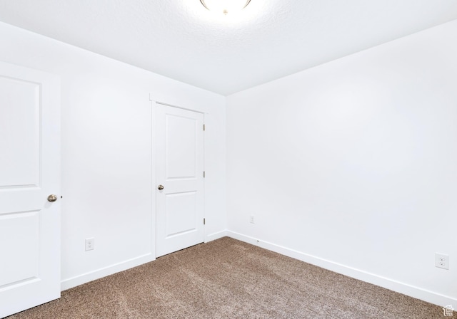 unfurnished bedroom featuring carpet floors