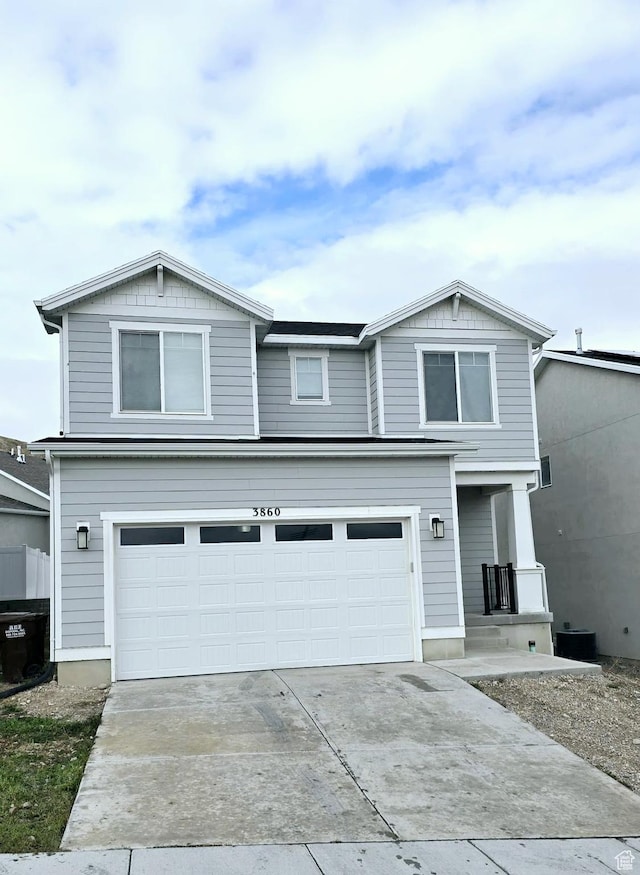 view of front of property featuring a garage