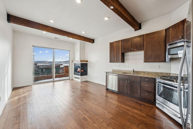 6169 Park Ln Unit 37, Park City, UT 84098 - kitchen featuring sink, dark hardwood / wood-style flooring, stainless steel appliances, beam ceiling, and light stone countertops