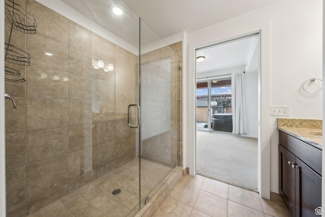 6169 Park Ln Unit 37, Park City, UT 84098 - bathroom featuring vanity, an enclosed shower, and tile patterned flooring