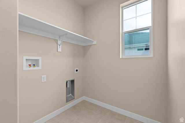 622 W Junegrass Ln, Stansbury Park, UT 84074 - washroom with light tile patterned floors, hookup for a washing machine, and electric dryer hookup