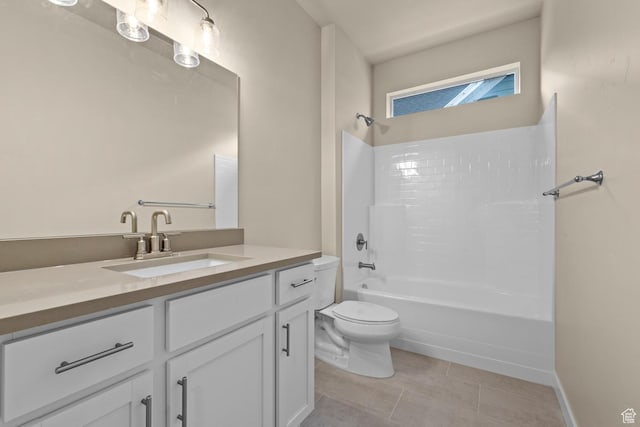 622 W Junegrass Ln, Stansbury Park, UT 84074 - full bathroom featuring shower / bathing tub combination, vanity, tile patterned floors, and toilet